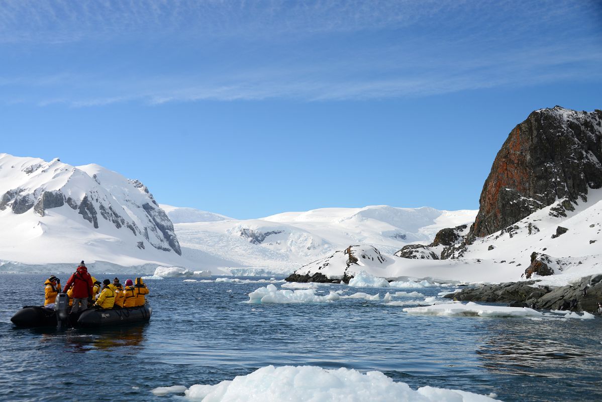 12A Zodiac Travels Around The Lichen Clad Cliffs Of Cuverville Island With Small Mountains And Glaciers On Antarctica On Quark Expeditions Antarctica Cruise